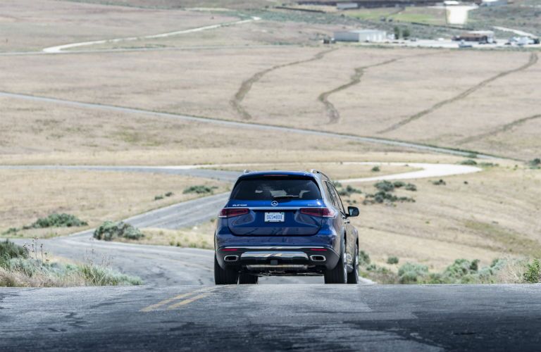 2020 MB GLS exterior back fascia on winding road