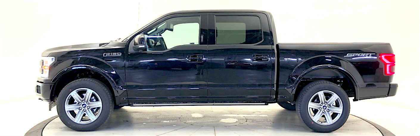 Profile view of black 2019 Ford F-150 Lariat