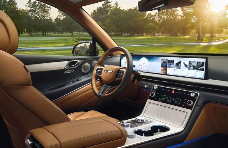 interior steering and dashboard of a Genesis SUV