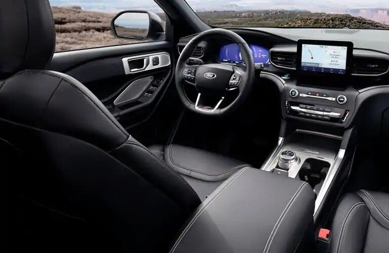 Front seat, steering wheel and centre touchscreen of 2020 Ford Explorer ST