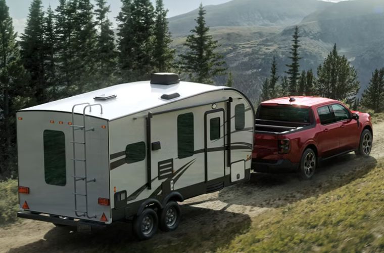 2026 Ford Maverick Lariat towing a trailer