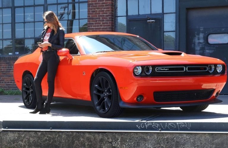 Dodge car with its owner