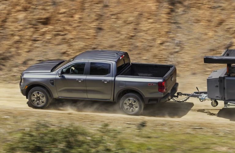 2025 Ford Ranger side view on a dirt road
