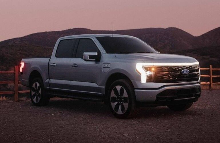 2022 FordF-150 Lightning XLT side and front view