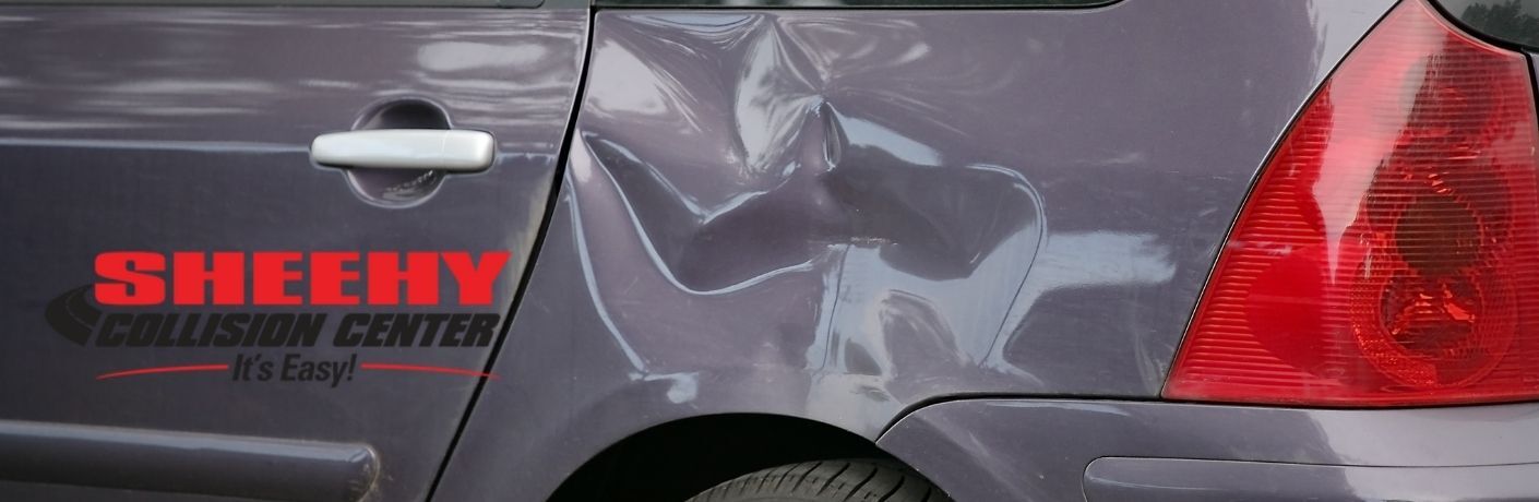 Dented Rear Fender and Sheehy Collision Center Logo