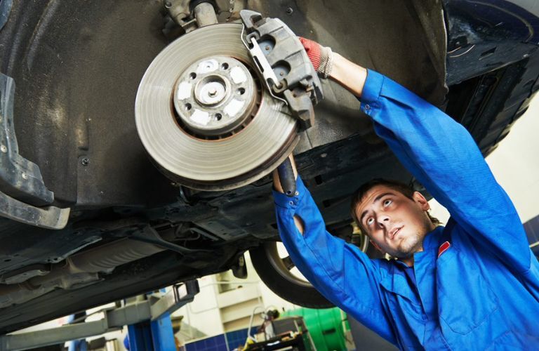 mechanic working on a vehicle