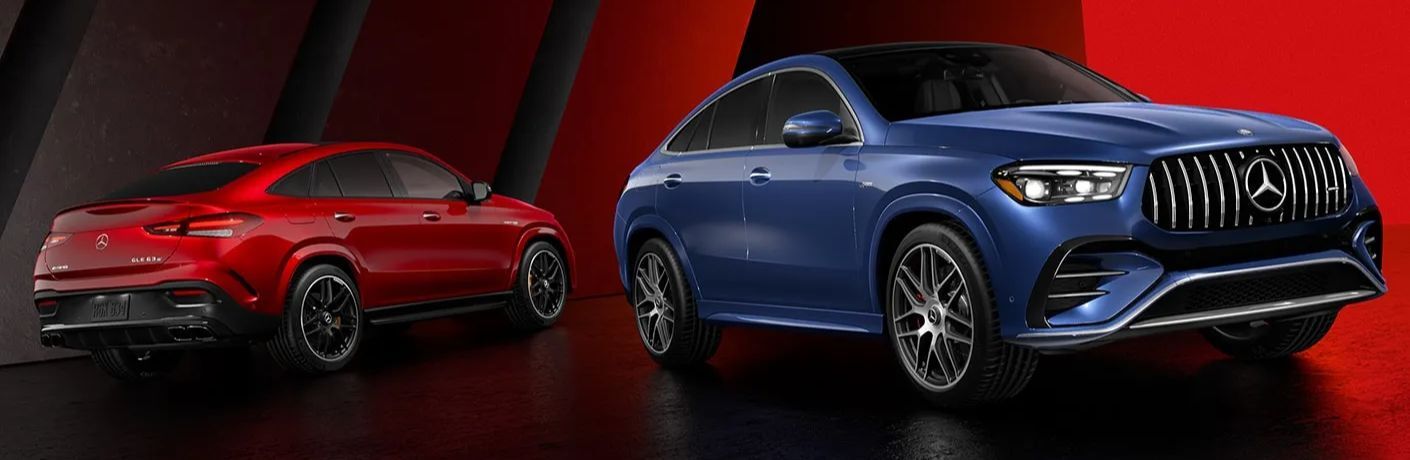 View of two 2024 Mercedes-AMG GLE 53 Coupe SUVs parked