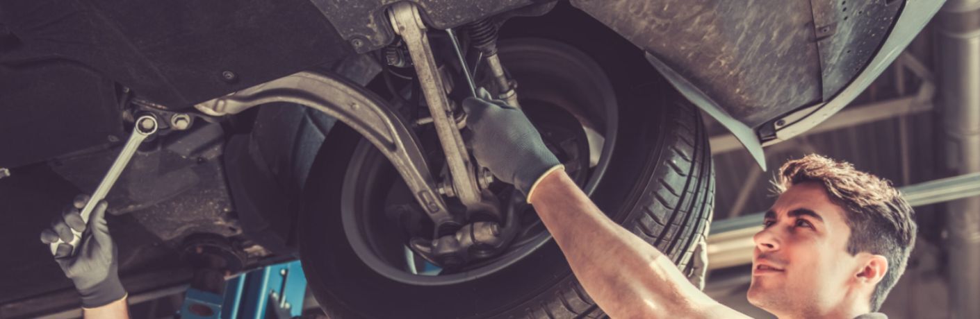 A man working on the vehicle