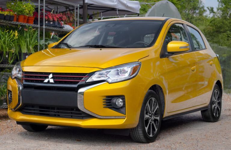 Front quarter view of a yellow 2022 Mitsubishi Mirage.
