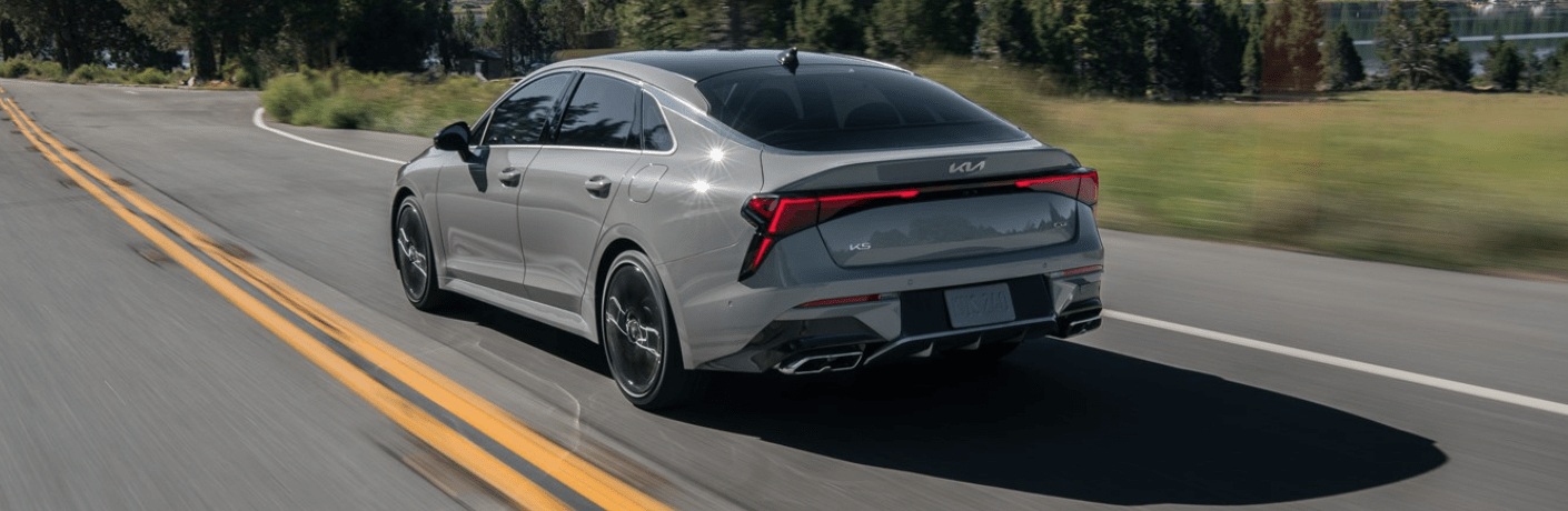 Back view of the 2025 Kia K5 on road