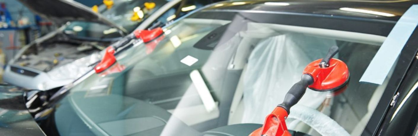 windshield repair service being undertaken at a service center