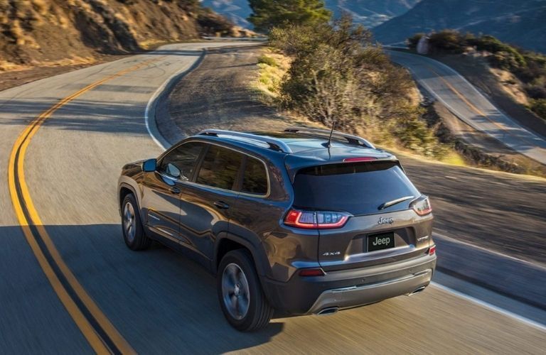 2020 Jeep Cherokee driving rear view
