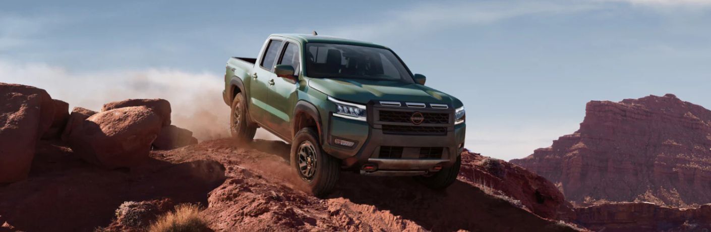 2026 Nissan Frontier side and front view
