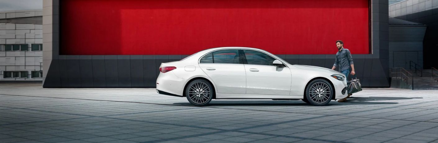 Mercedes-Benz C-Class Sedan side view in white