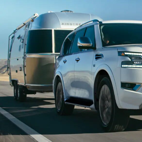 2024 Nissan Armada towing a camper.