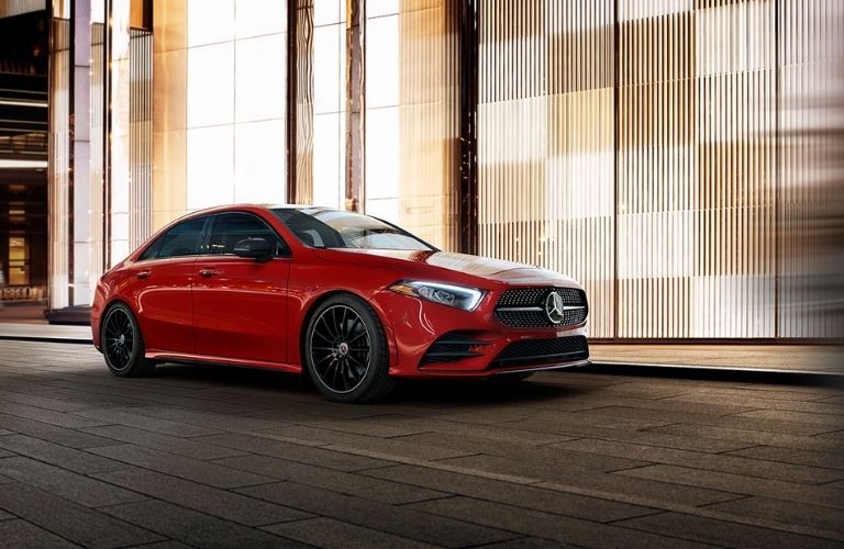 Mercedes-Benz parked near a building