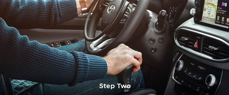 Man driving Hyundai vehicle