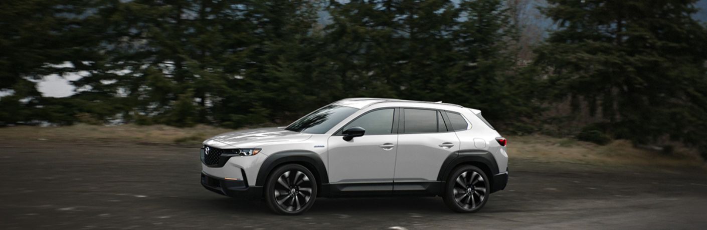 side view of the 2025 Mazda CX-50 on the road