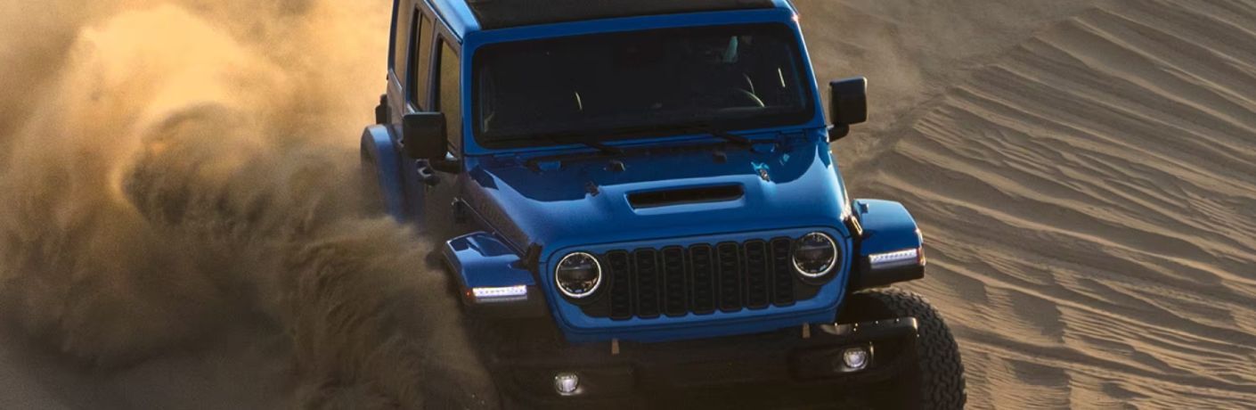 2024 Jeep Wrangler on a sandy terrain