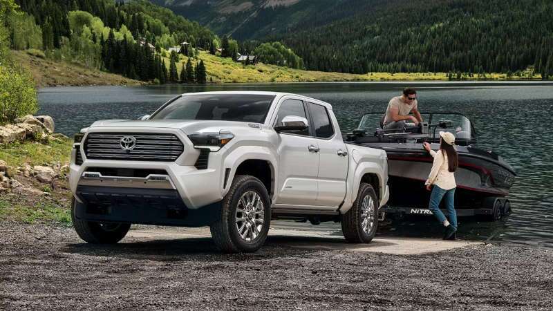 The 2026 Toyota Tacoma towing a ski boat