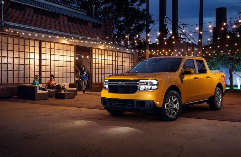Ford Maverick Hybrid parked outside a house