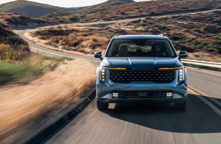 2026 Kia Carnival front view on a road