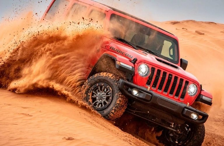 Jeep Wrangler in a sandy terrain