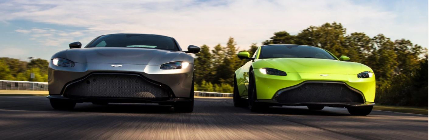 Pre-Owned Aston Martin convertibles on a road
