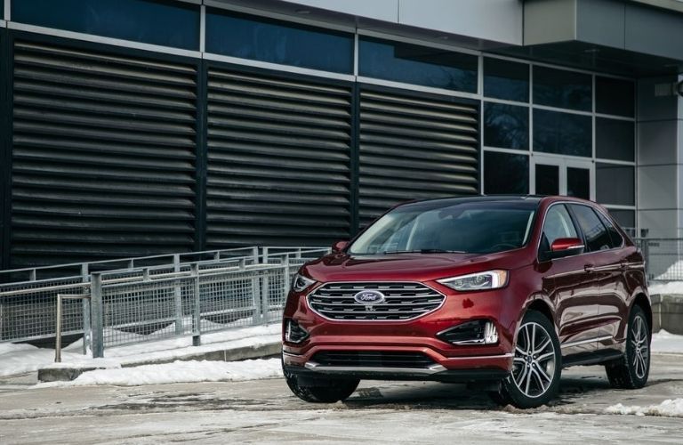 Ford SUV near a building