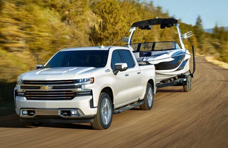 Used Chevrolet Silverado White towing a boat