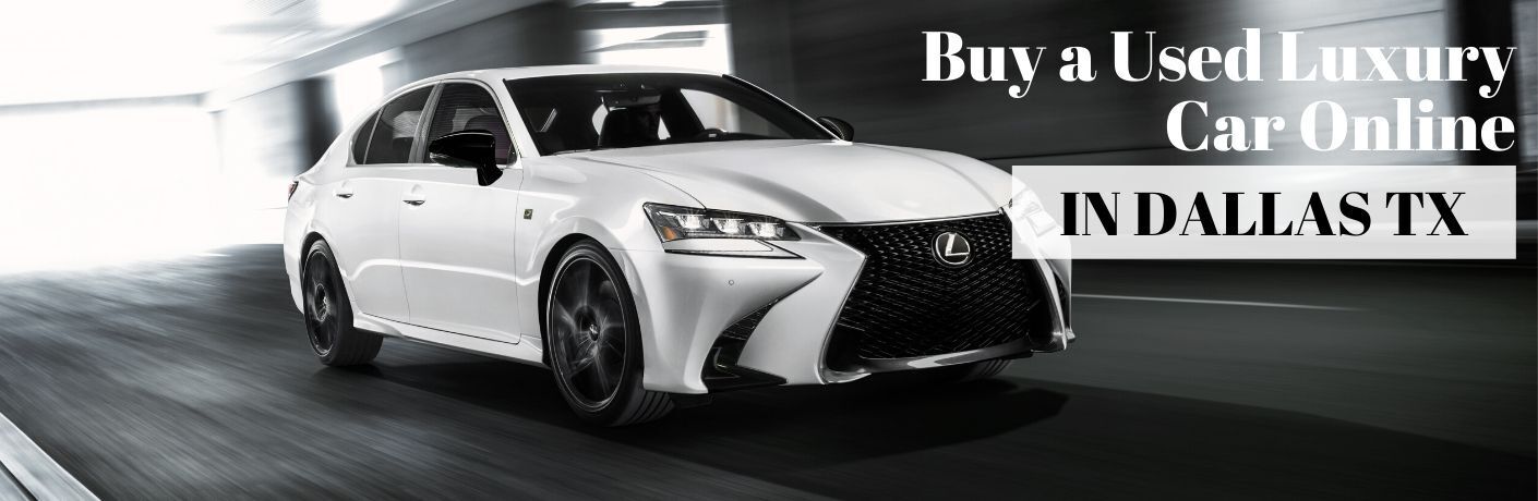 White 2020 Lexus GS in a Tunnel with White Buy a Used Luxury Car Online Text with Black In Dallas TX Text on a White Text Box