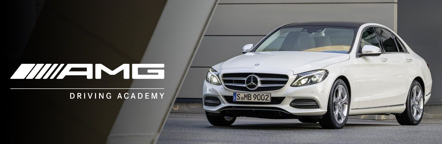 White AMG Driving Academy Text with White Mercedes-Benz