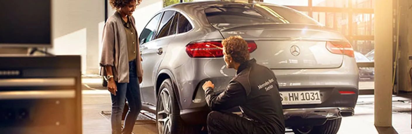 a technician working on a car
