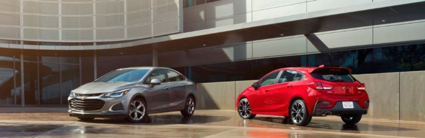 Two 2019 Chevrolet Cruze parked