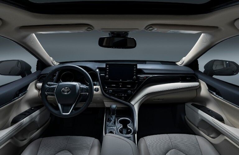 Steering wheel, gauges, and touchscreen in 2021 Toyota Camry