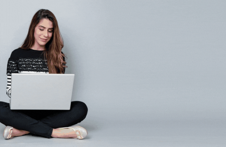 Woman shops for a car online, with digitized car images appearing next to her in gif form