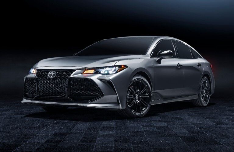 Driver's side front angle view of silver 2021 Toyota Avalon