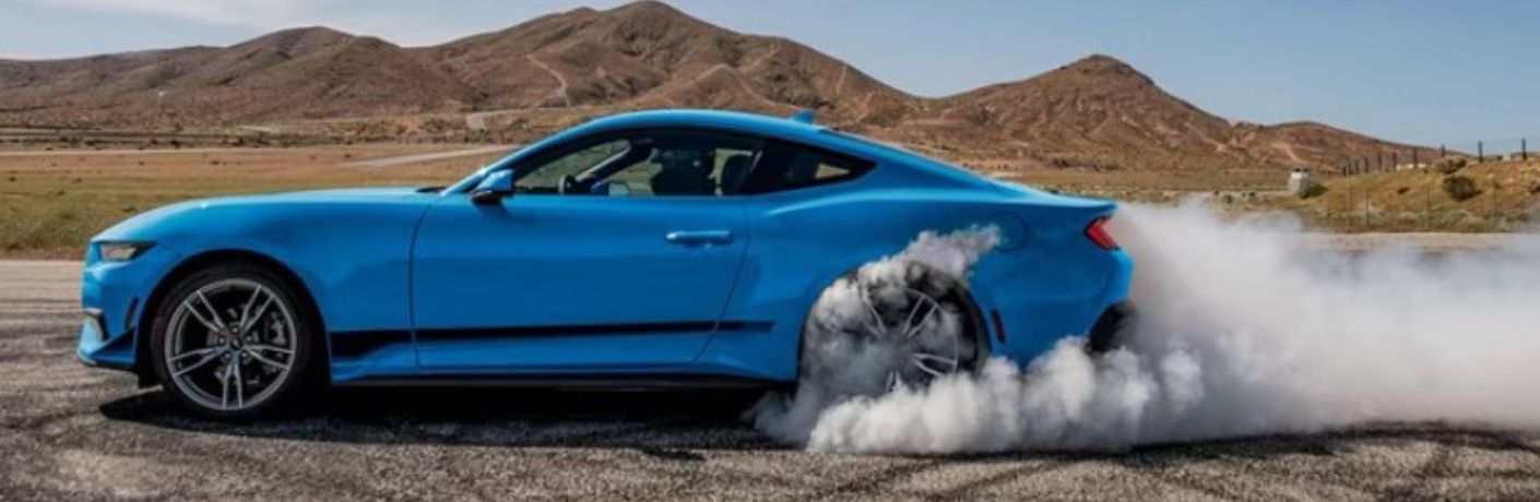 2025 Ford Mustang side view in blue