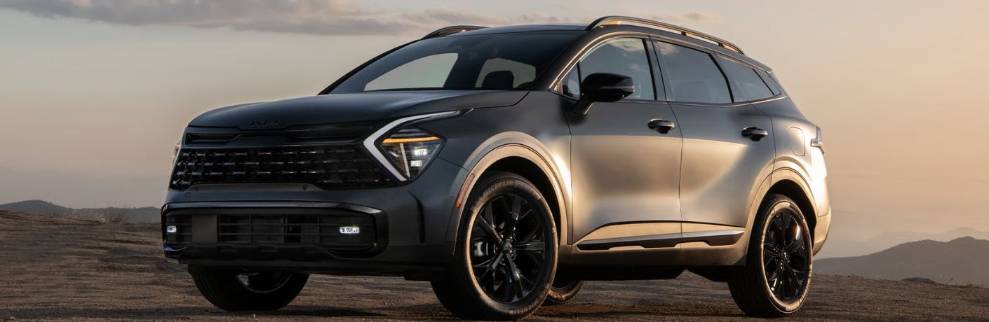 Front-quarter view of the 2026 Kia Sportage PHEV Gray