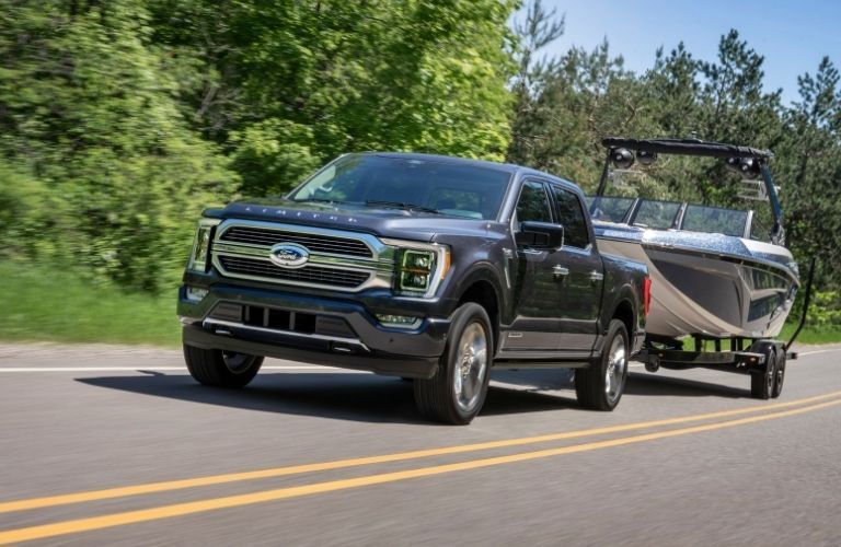 A Ford F-150 towing a boat
