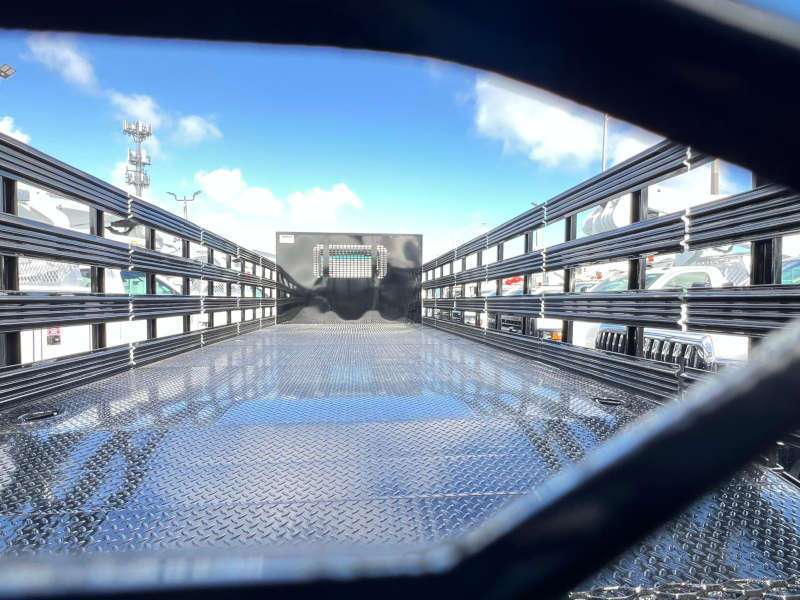 A detail of the bed of a large flatbed truck