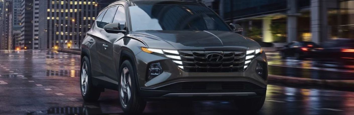 A 2023 Hyundai Palisade on a smooth curved road