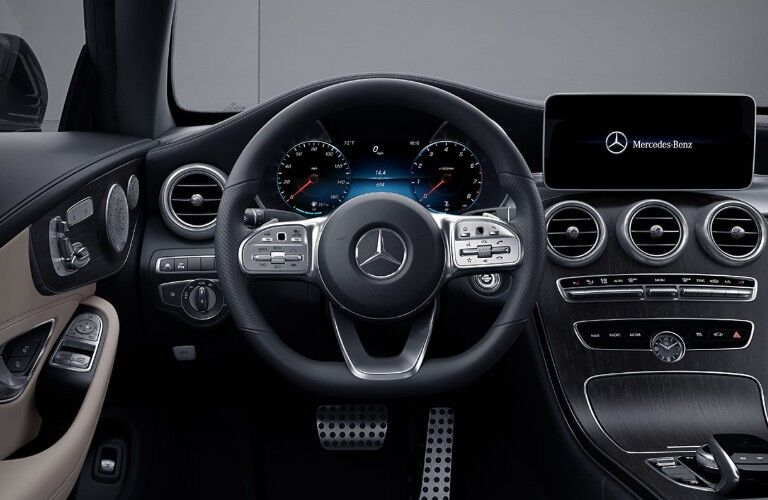 Close up of the steering wheel inside the 2020 Mercedes-Benz C-Class Coupe
