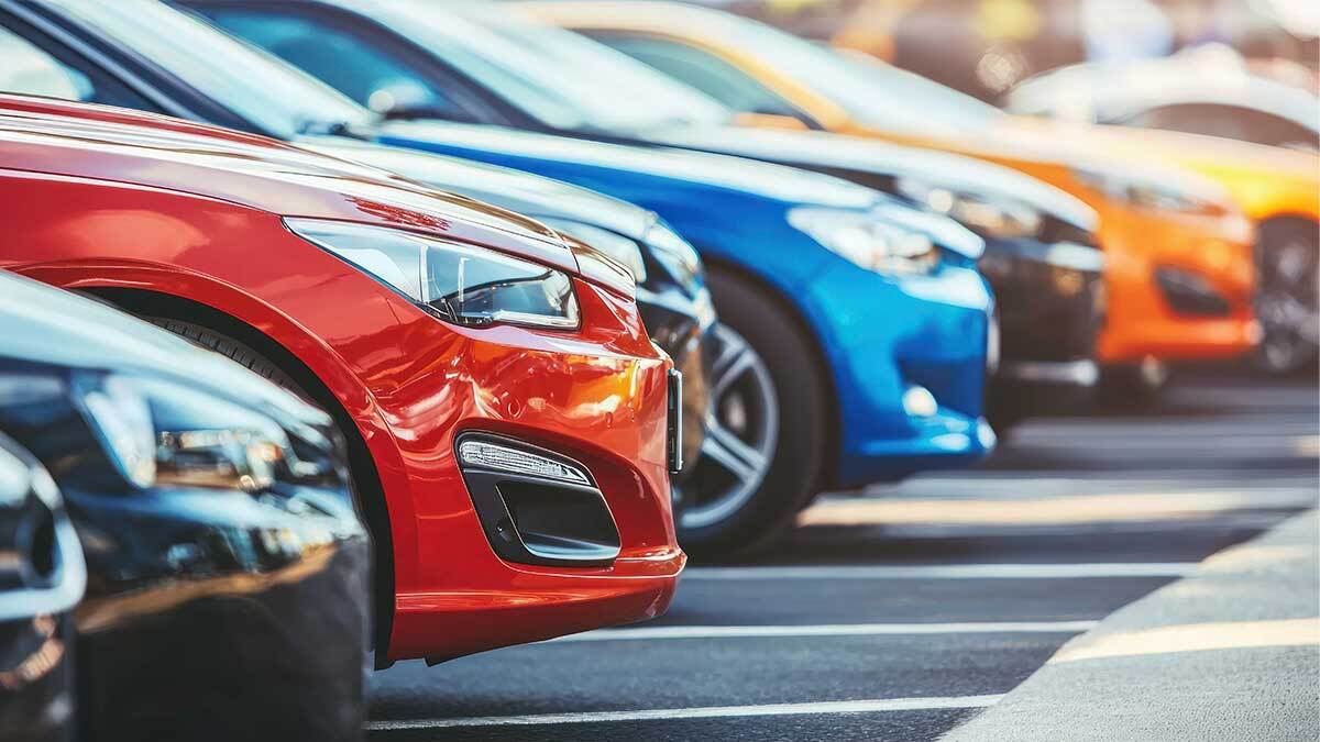 Line up of cars in a parking lot