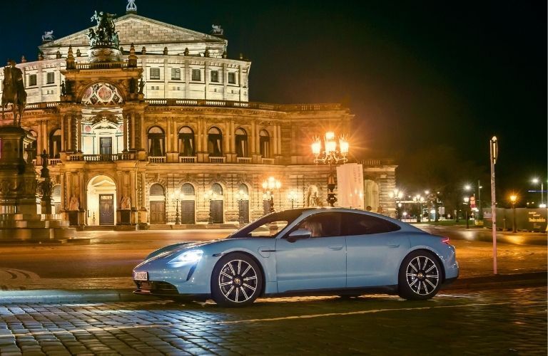 2020 Porsche Taycan parked in front of a building