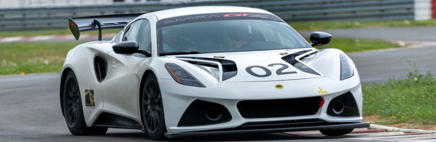 A Lotus Emira GT4 on the road