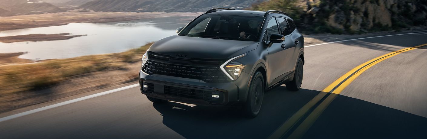 2025 Kia Sportage PHEV on a road front view