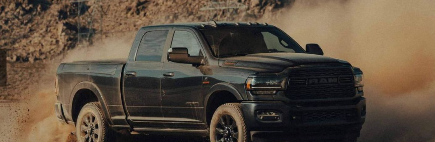 A 2022 RAM 2500 on a sandy terrain