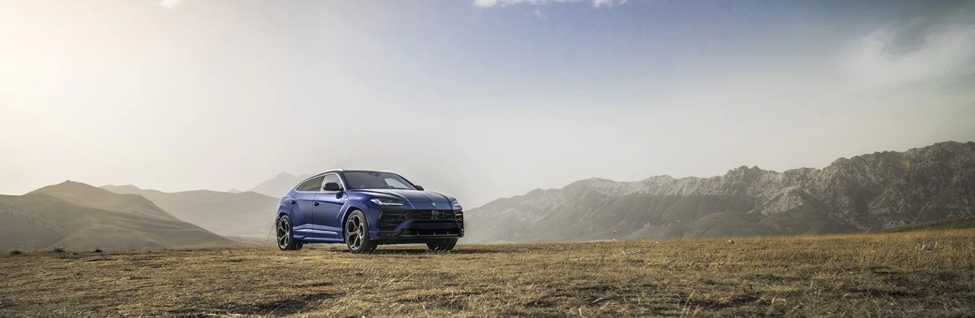 Lamborghini Urus parked off-road
