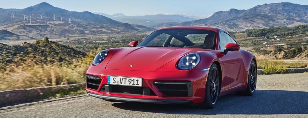 A man driving the 2022 Porsche 911 GTS